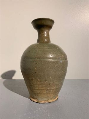  Goryeo Celadon Vase with Incised Floral Design: A Journey into Ancient Korea’s Ceramic Soul!